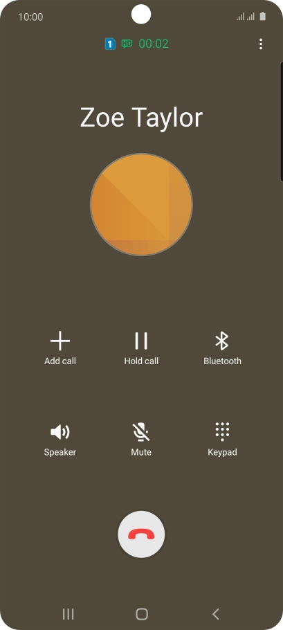 Press the end call icon.