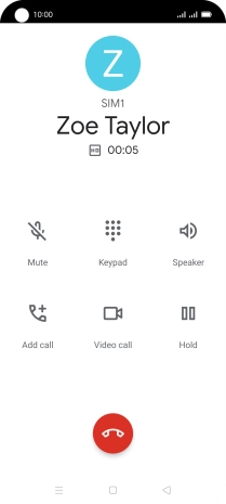Press the end call icon.