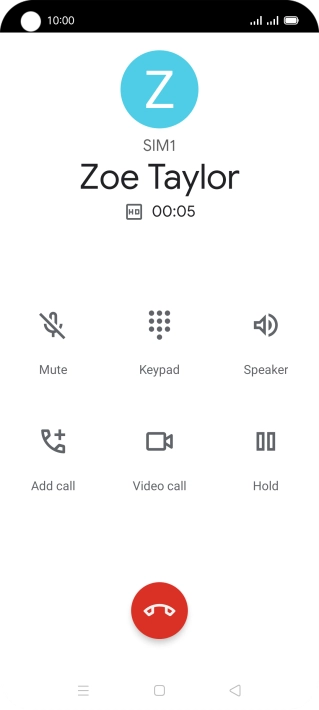 Press the end call icon.