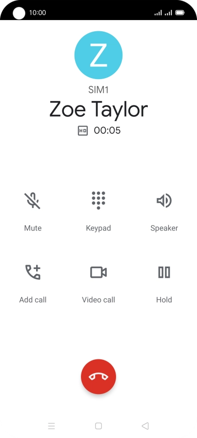 Press the end call icon.