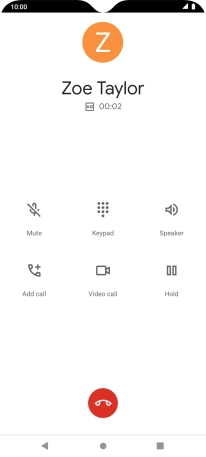 Press the end call icon.
