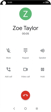Press the end call icon.