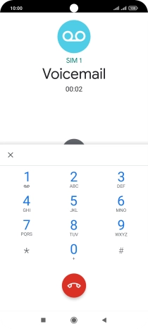 Press the end call icon.