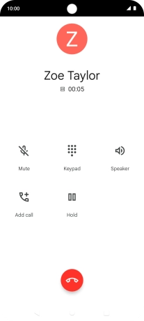 Press the end call icon.