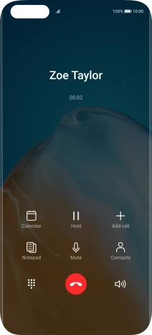 Press the end call icon.