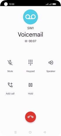 Press the end call icon.