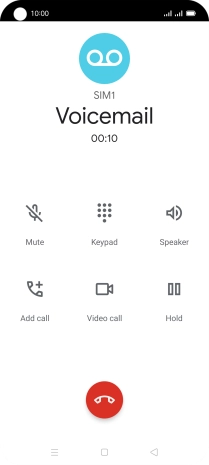 Press the end call icon.