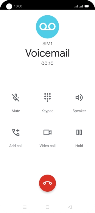 Press the end call icon.
