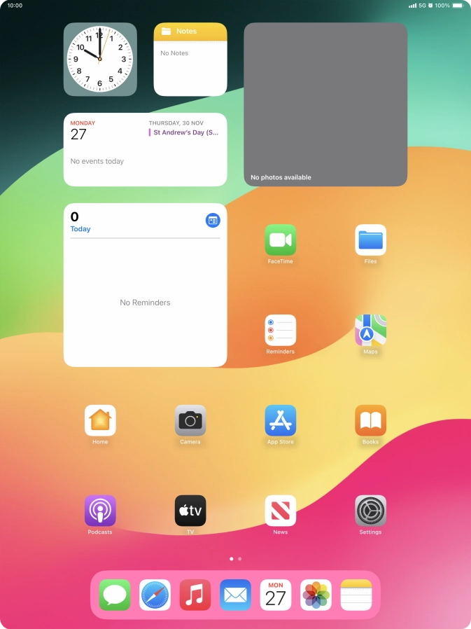 The alarm icon shows that the alarm is set.