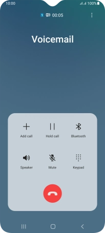 Press the end call icon.