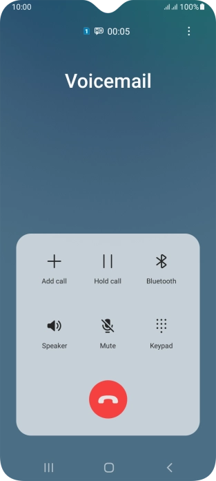 Press the end call icon.