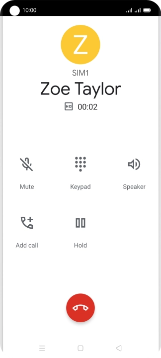 Press the end call icon.