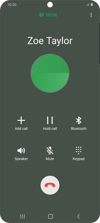 Press the end call icon.
