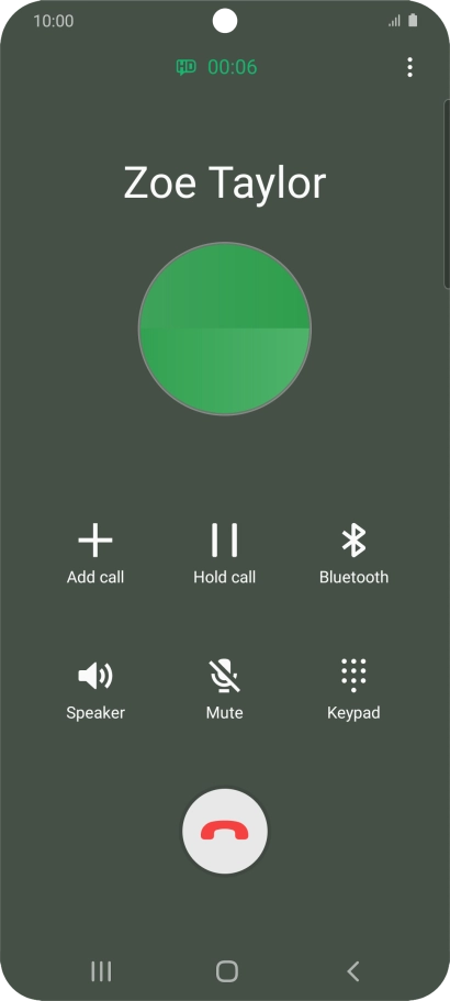 Press the end call icon.