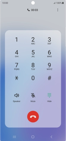 Press the end call icon.