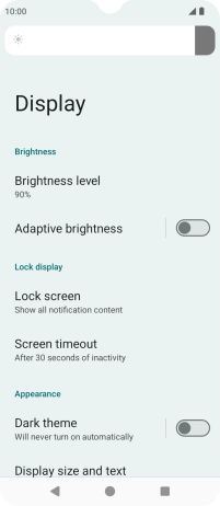Drag the indicator right or left to set the brightness manually.