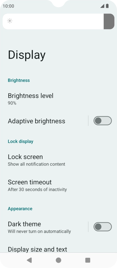 Drag the indicator right or left to set the brightness manually.