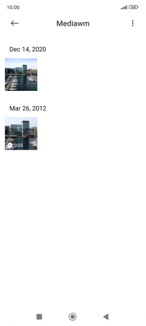 Press and hold any picture or video clip.