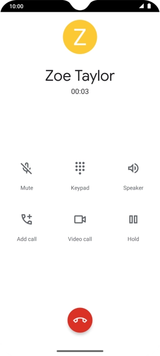Press the end call icon.