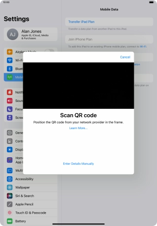 Place the QR code you've received inside the tablet camera frame to scan the code. Your eSIM is transferred to your new tablet over the internet.