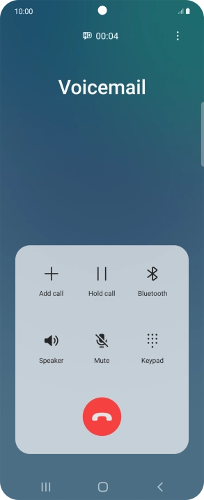 Press the end call icon.