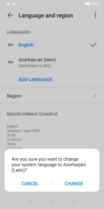 To select the new language as the default language, press CHANGE.