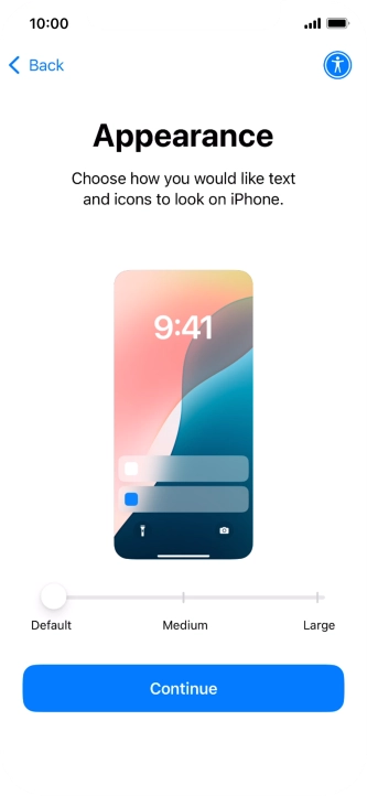 Select the required text and icon size on your phone and press Continue.
