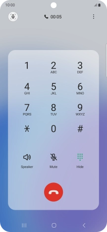 Press the end call icon.