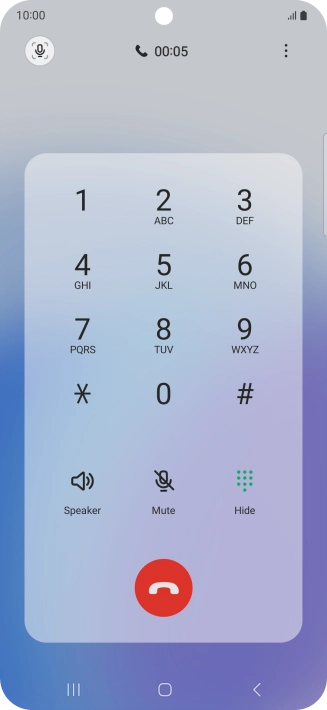 Press the end call icon.