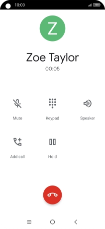 Press the end call icon.