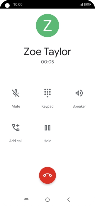 Press the end call icon.