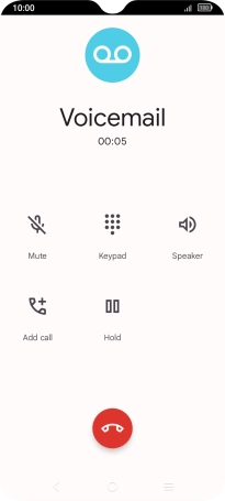 Press the end call icon.