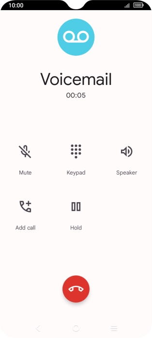Press the end call icon.