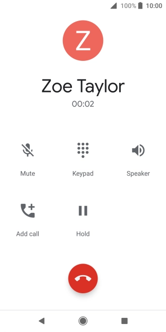 Press the end call icon.