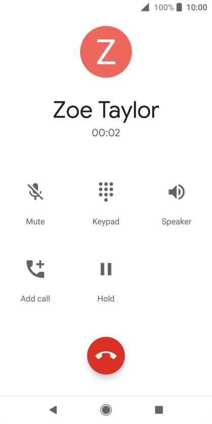 Press the end call icon.
