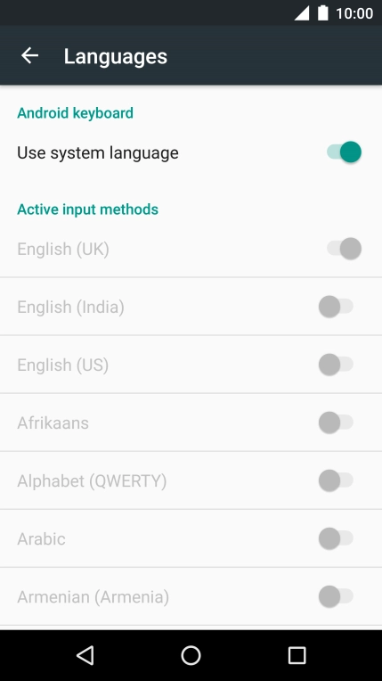 Press Use system language to turn it off.