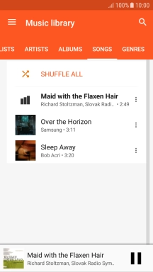 Press the song title at the bottom of the screen.