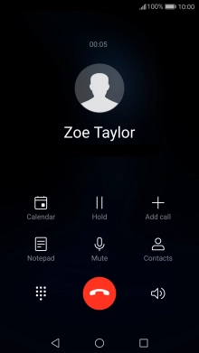 Press the end call icon.