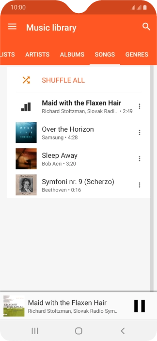 Press the song title at the bottom of the screen.