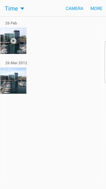 Go to the required folder and press the required picture or video clip.