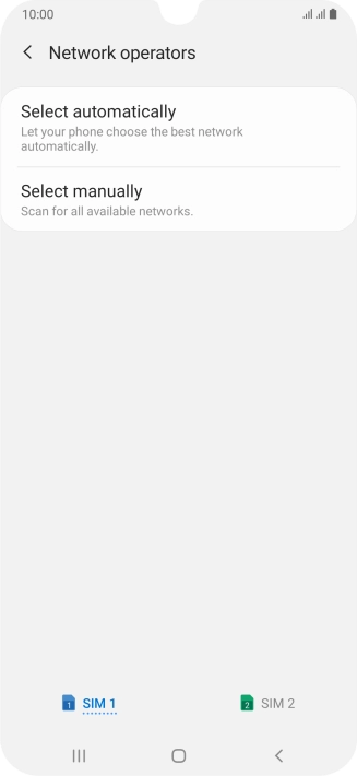Press Select manually and your phone will search for networks.