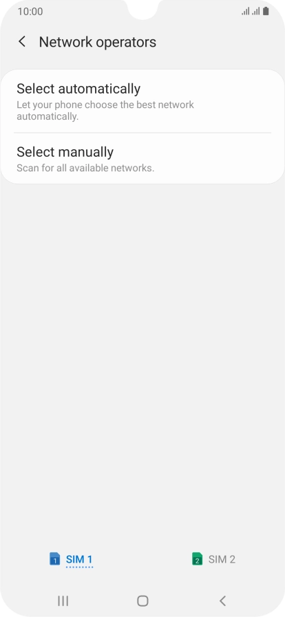 Press Select manually and your phone will search for networks.