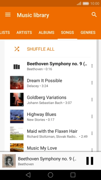 Press the song title at the bottom of the screen.