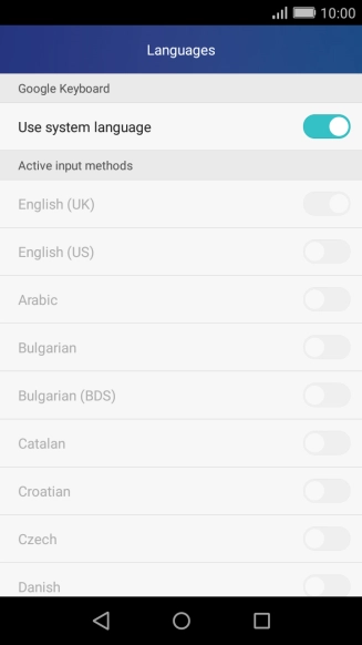 Press Use system language to turn it off.