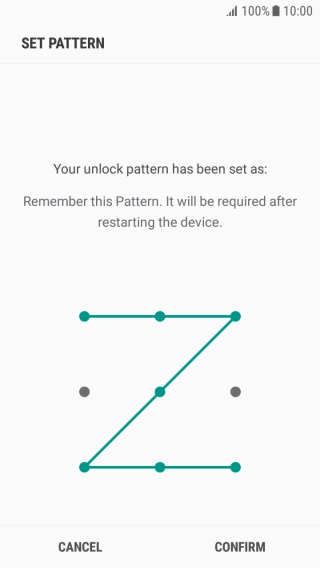 Repeat the selected phone lock code and press CONFIRM.