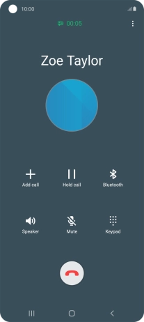 Press the end call icon.