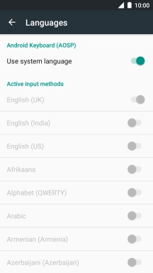 Press Use system language to turn it off.