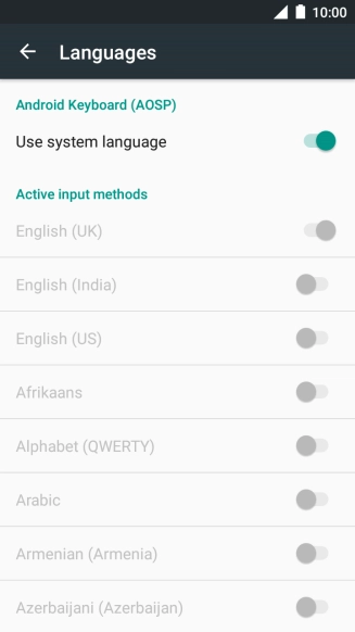 Press Use system language to turn it off.