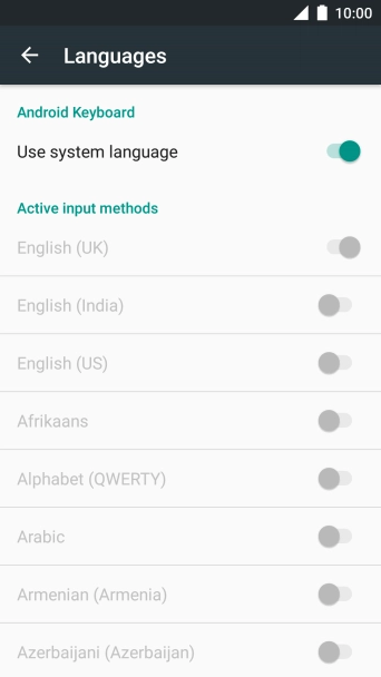 Press Use system language to turn it off.