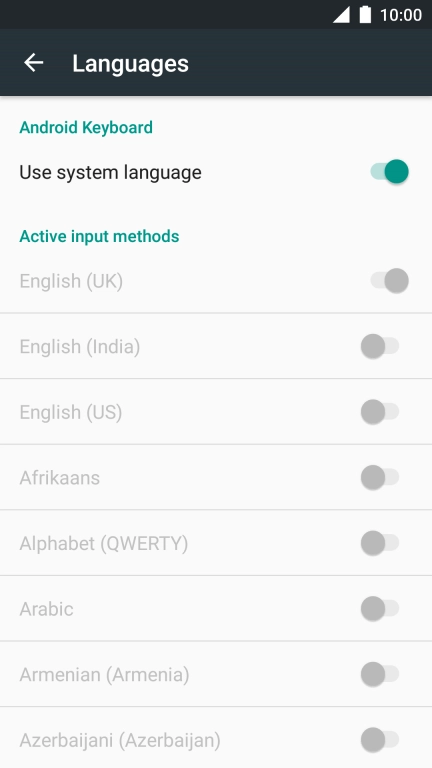 Press Use system language to turn it off.